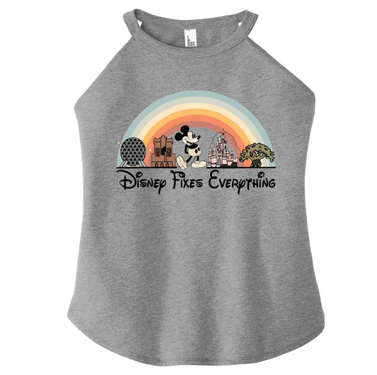 A gray short sleeve female tank top with a graphic that includes Disney park icons and the text 'Disney Fixes Everything' in a rainbow-colored arch.