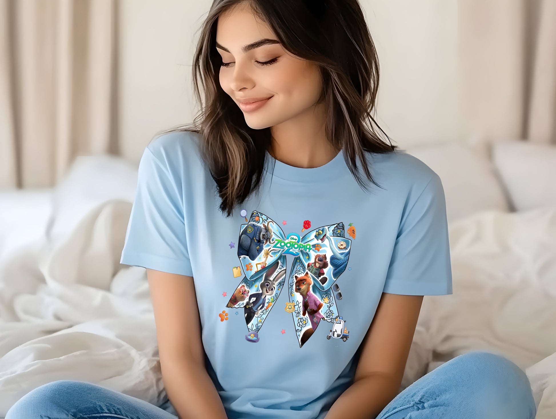 Zootopia bow graphic tee with cartoon-inspired theme park design