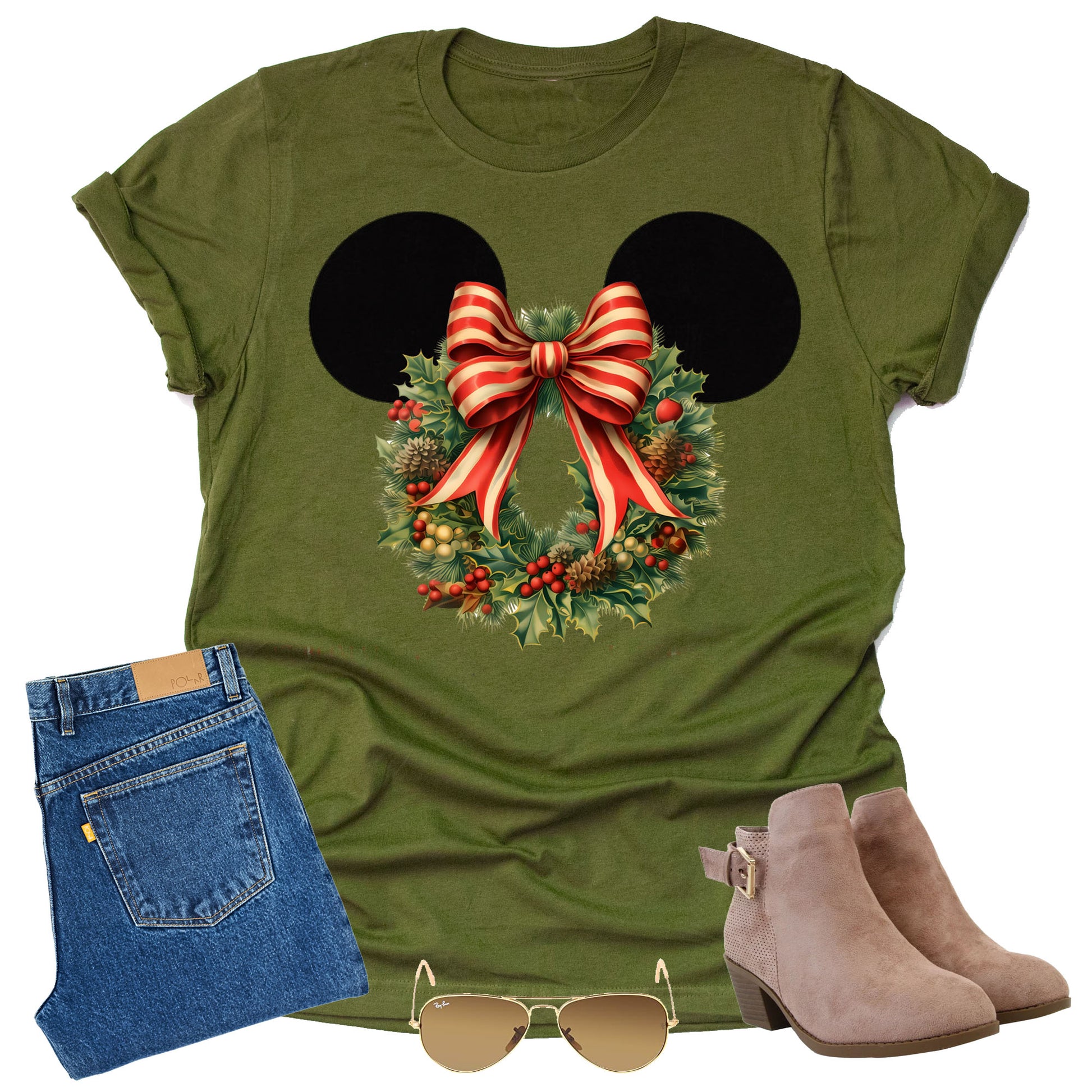 Women's olive t-shirt featuring a graphic of Minnie Mouse ears with a Christmas flower wreath and a red and white striped bow. pants sunglasses and boots on a white background
