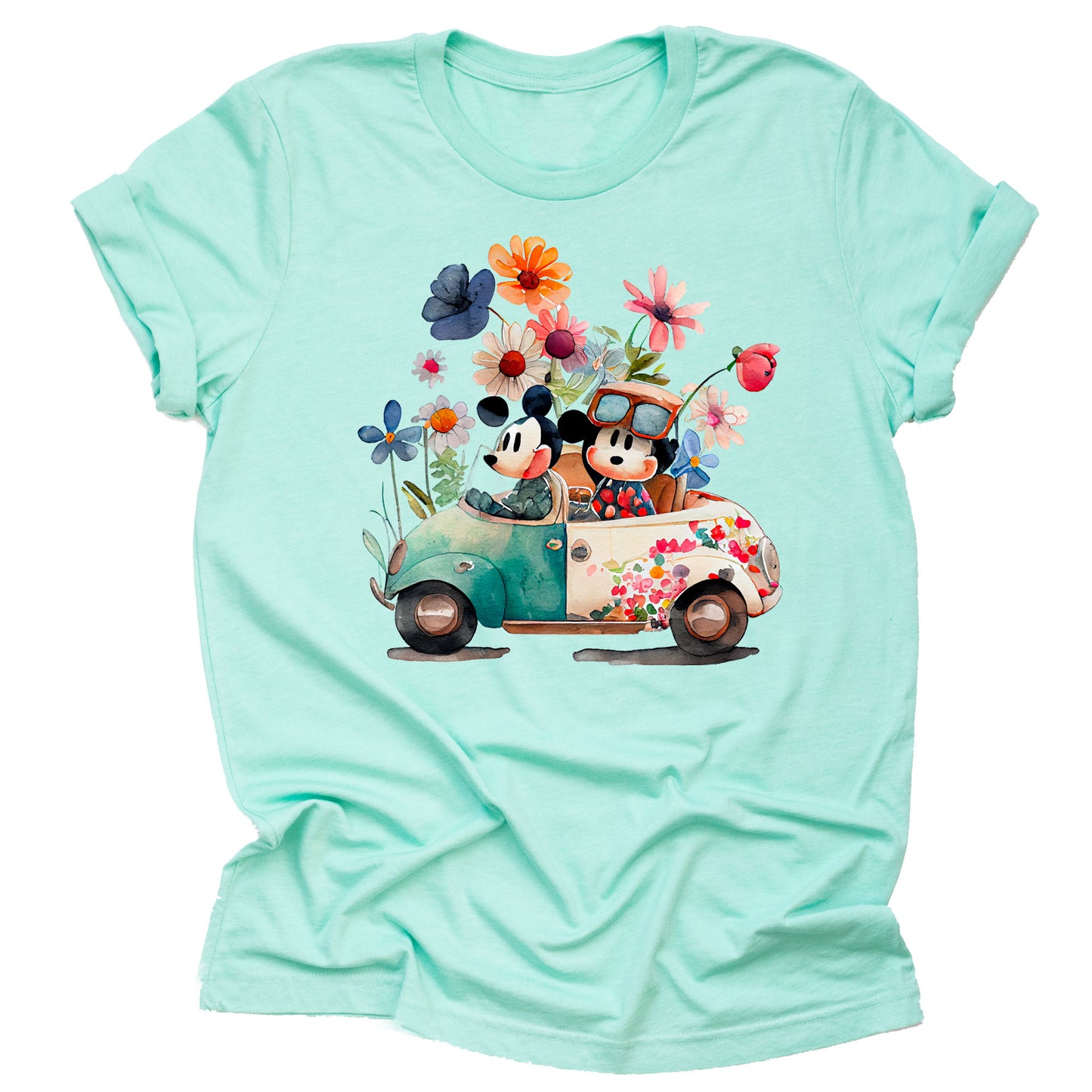 mint-colored unisex t-shirt featuring an illustration of Mickey and Minnie Mouse sitting a Volkswagen in garden attire, surrounded by floral elements and a whimsical design.