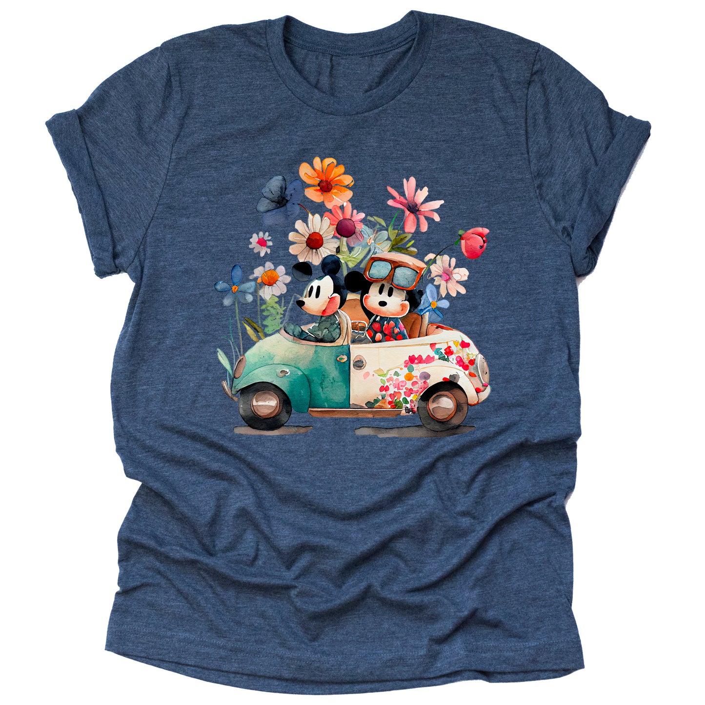 A navy-colored unisex t-shirt featuring an illustration of Mickey and Minnie Mouse sitting a Volkswagen in garden attire, surrounded by floral elements and a whimsical design.