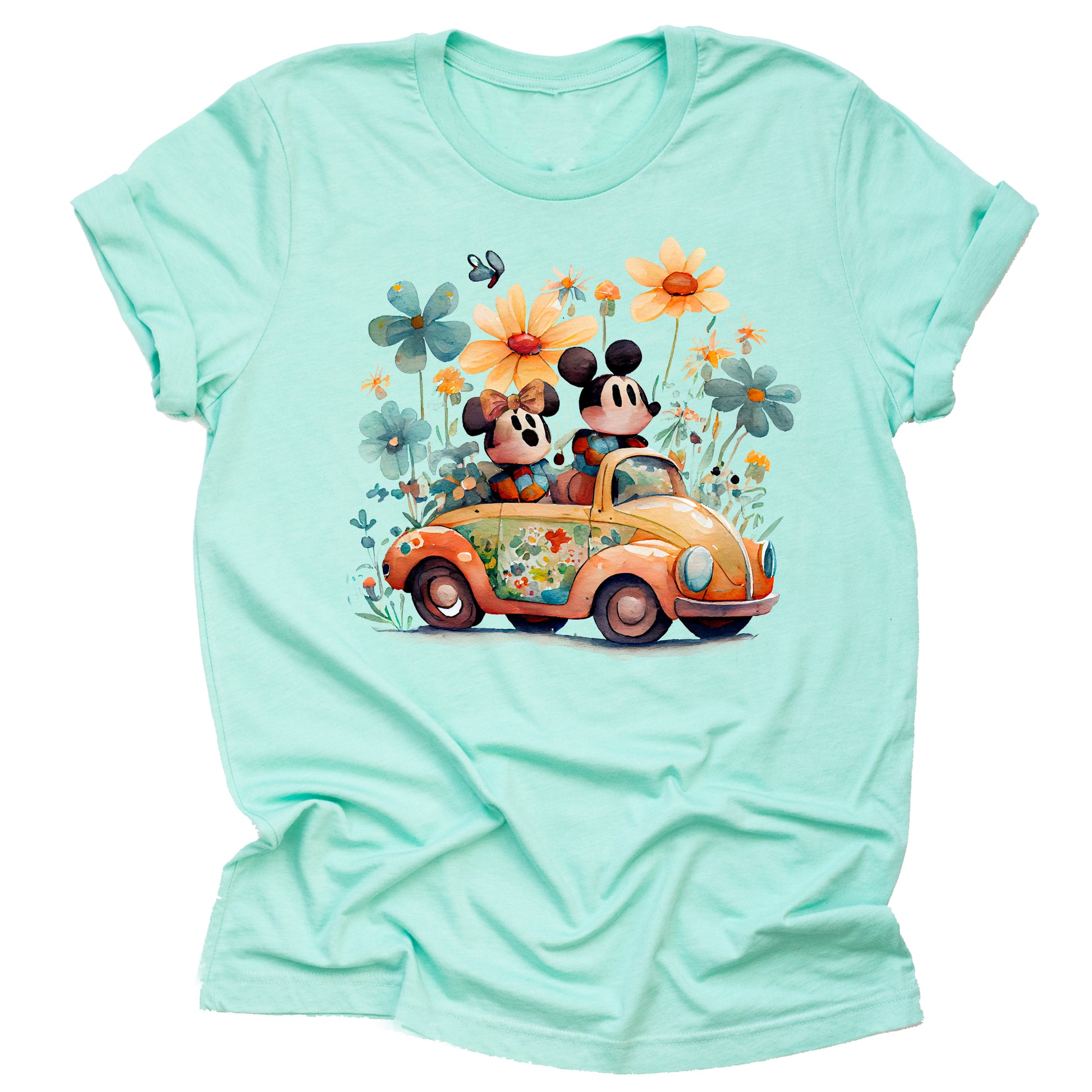 mint t-shirt with an illustration of Mickey and Minnie Mouse in a car surrounded by floral elements.