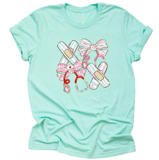 Mint nurse shirt with bandage bow design for RN nurses and healthcare workers
