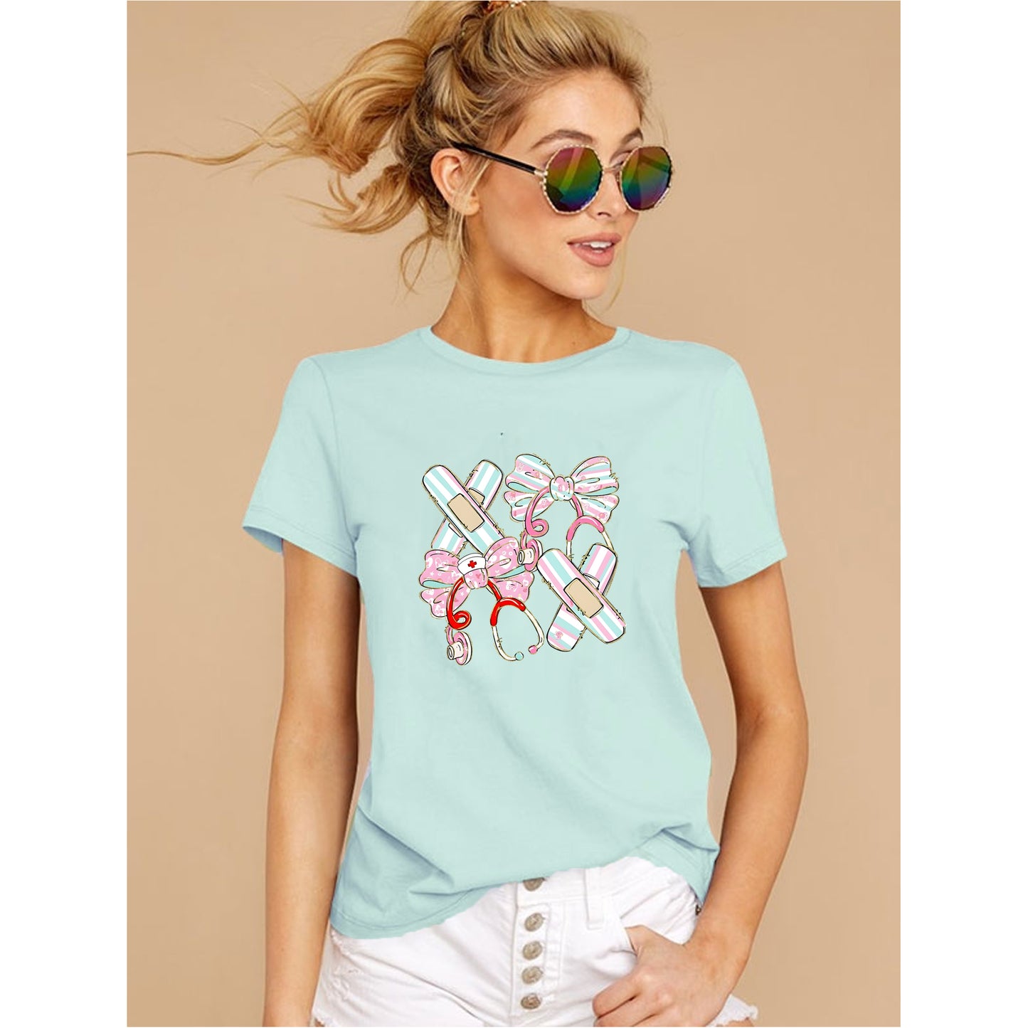 Mint pink nurse shirt with bandage bow design for RN nurses and healthcare workers design