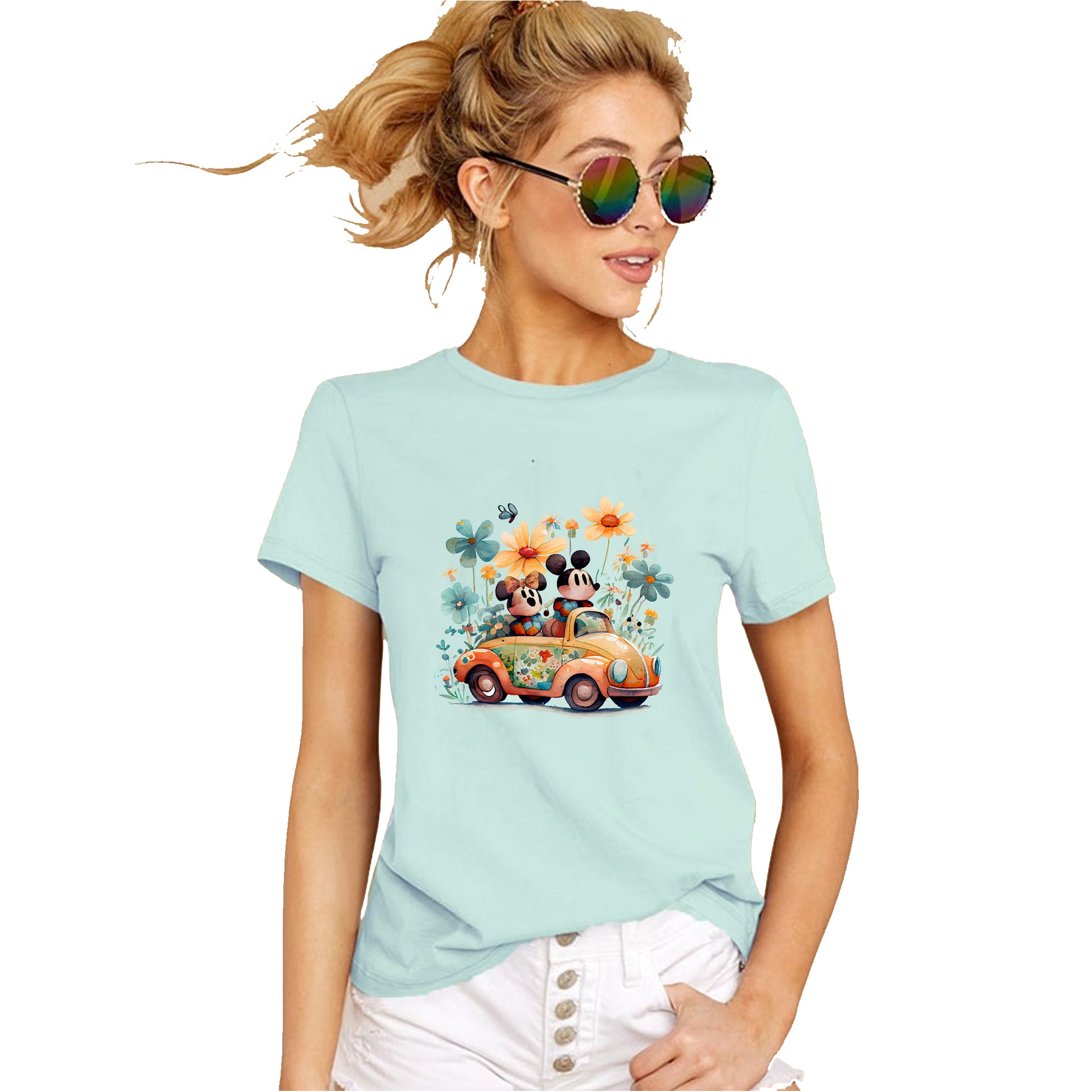 A person wearing a mint t-shirt with an illustration of Mickey and Minnie Mouse in a car surrounded by floral elements.