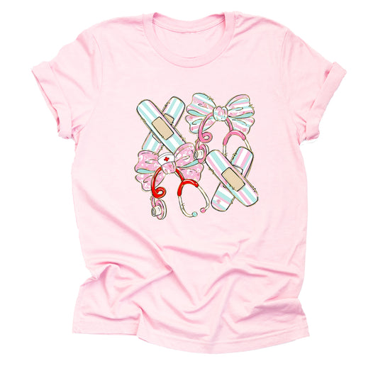 pink mint nurse shirt with bandage bow design for RN nurses and healthcare workers