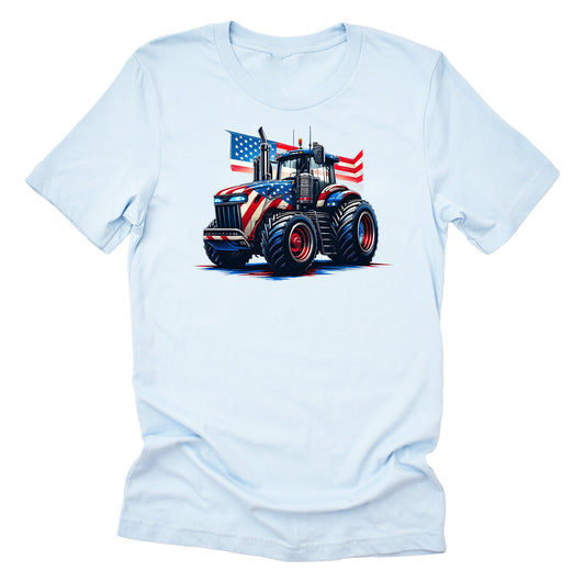 A light blue unisex short-sleeve t-shirt with a graphic of a patriotic tractor decorated with an American flag.