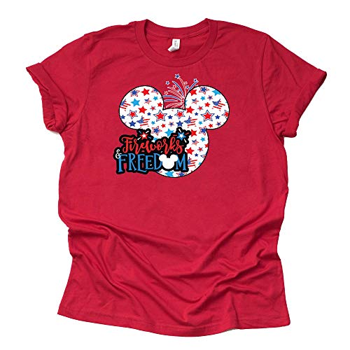 A red unisex short sleeve T-shirt with a design featuring Mickey Mouse and the text 'Disney's Freedom Fireworks' against a stars and stripes background.