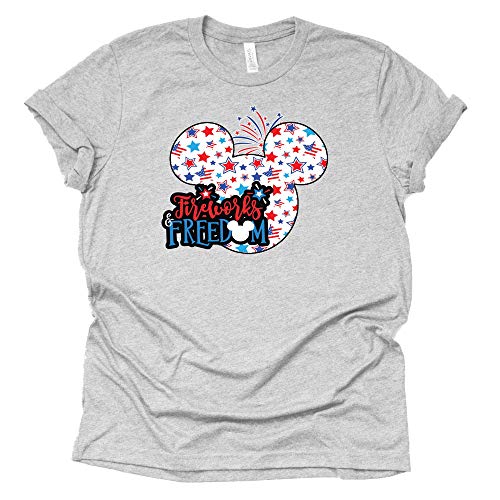 A gray unisex short sleeve T-shirt with a design featuring Mickey Mouse and the text 'Disney's Freedom Fireworks' against a stars and stripes background.